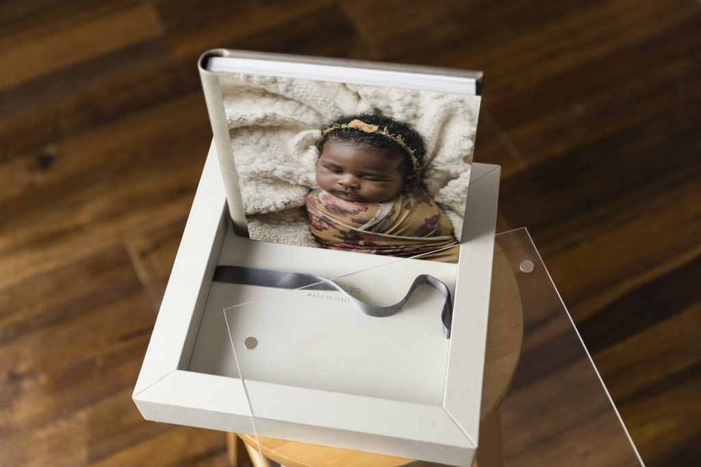 Newborn photo album designed by Boise photographer