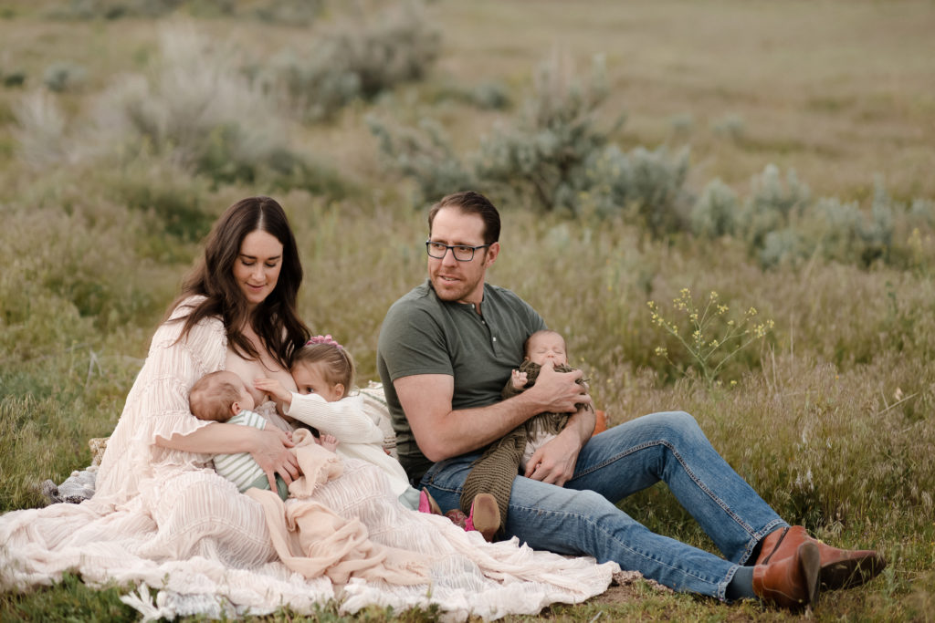 Family sitting in field near Boise, Idaho