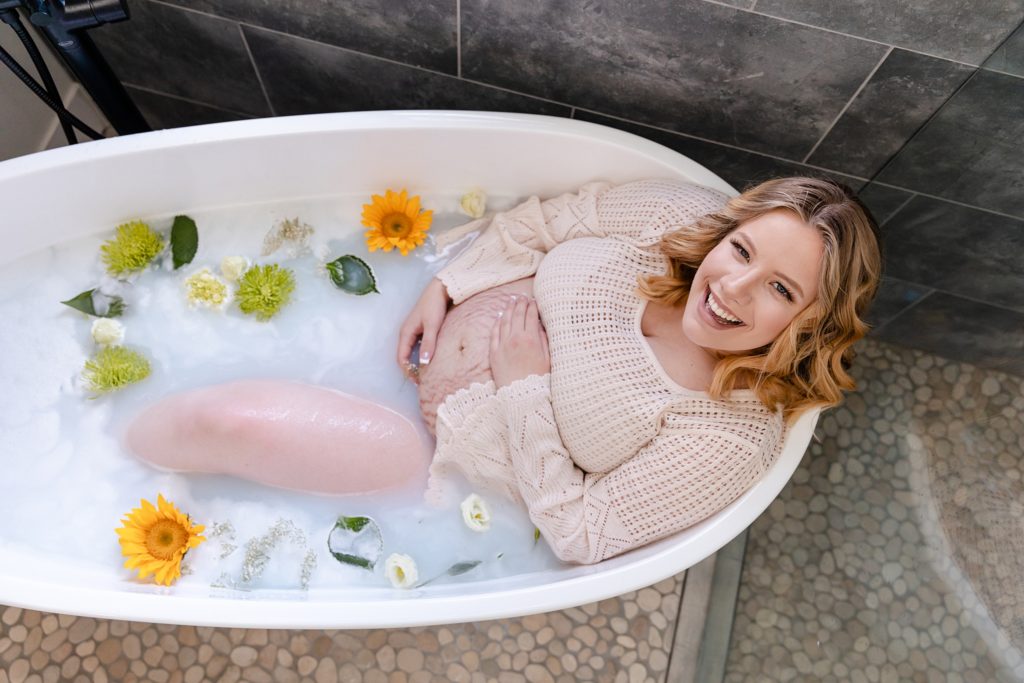 Milk bath maternity session with sunflowers