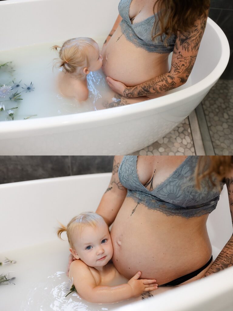 Elegant maternity milk bath portrait featuring expecting mother and daughter in dreamy breastmilk session with floating petals and natural light"